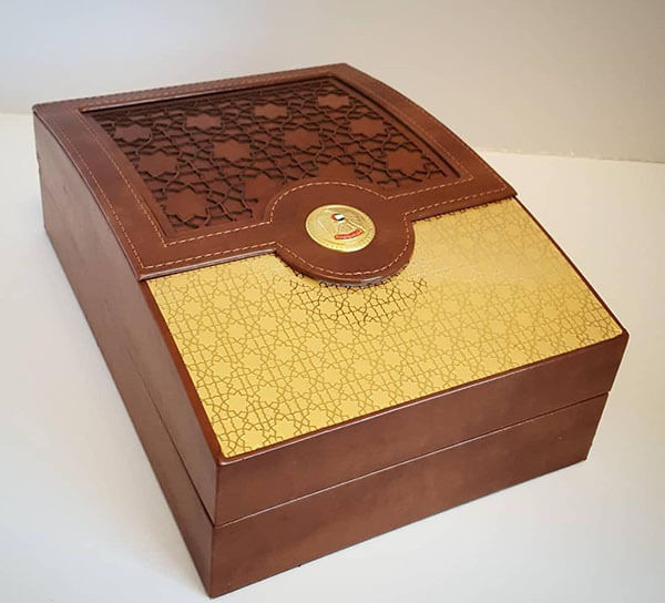 Elegant leather box with metal plate